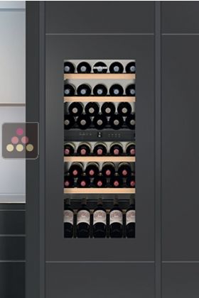 Cave à vin multi-usages de conservation et de service des vins intégrable à façade habillable