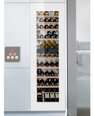 Cave à vin multi-usages de conservation et de service des vins encastrable a porte en verre blanche LIEBHERR